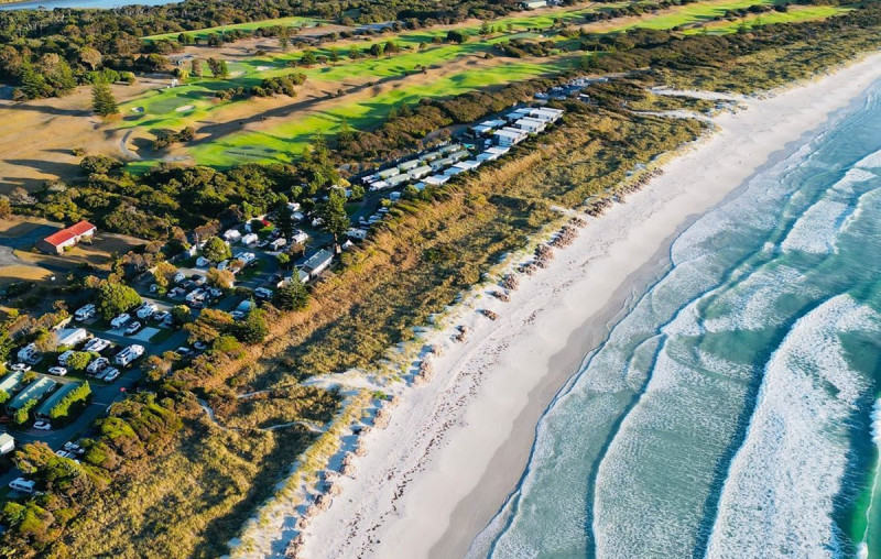 Aerial view showing golf course and lake where turtles live 1200px