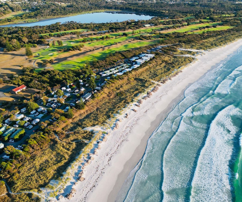 Aerial view showing golf course and lake where turtles live 1200px